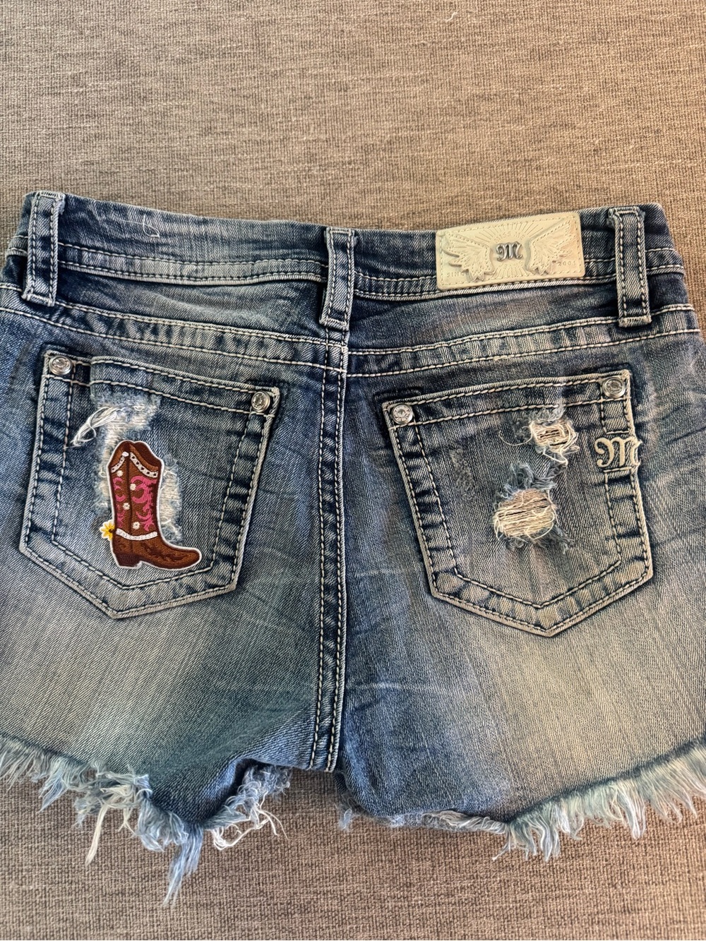 Miss Me Blue Distressed Denim Shorts with Embroidered Boot Patch